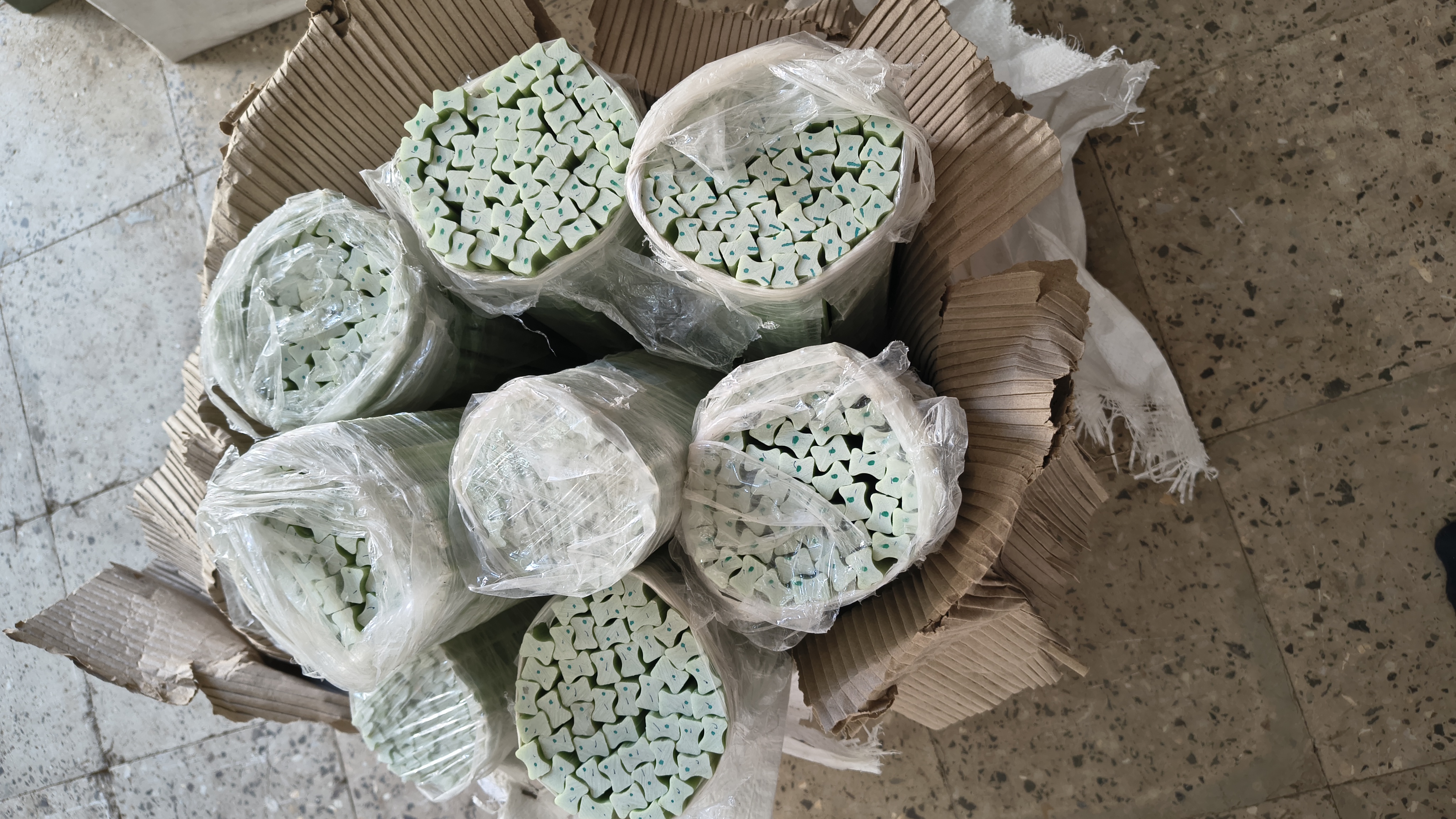 Dog bone profiles installed in dry-type transformer coil winding showing air duct channels